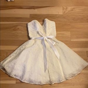 Strapless, white, with off-white overlay